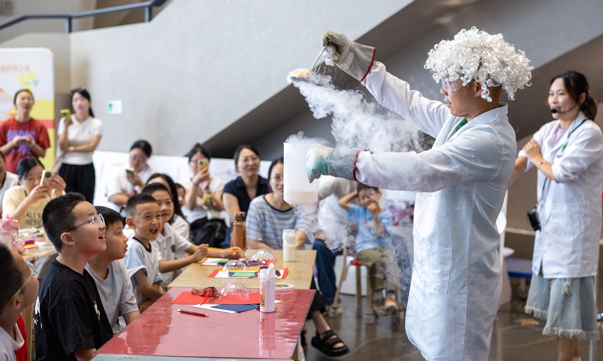 Students take a fun science class in Wenling, East China's Zhejiang Province, on September 13, 2026. Through intuitive and interesting experiments, abstract physical principles were turned into visible phenomena, allowing students to explore the mysteries of low-temperature science up close. Photo: VCG