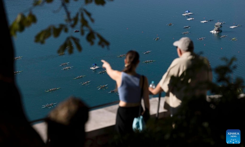 People watch the 2026 World Rowing Masters Regatta Bled in Bled, Slovenia, Sept. 12, 2026. (Photo by Zeljko Stevanic/Xinhua)
