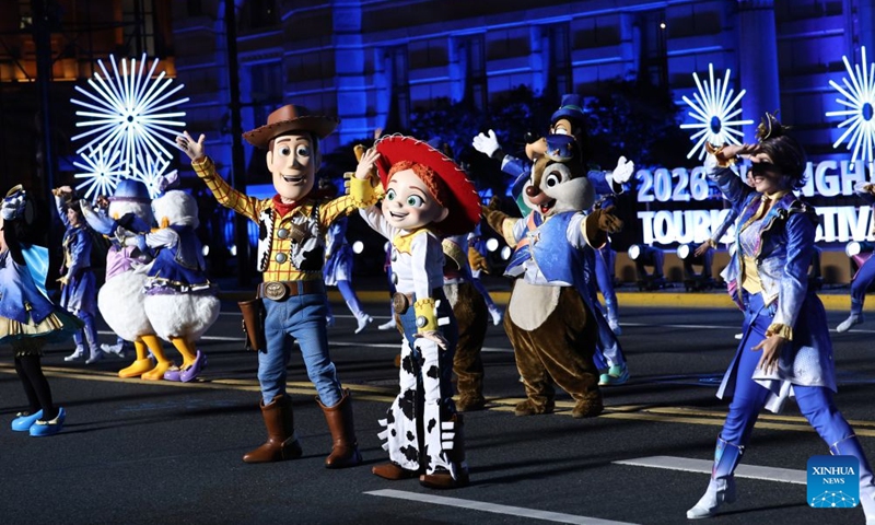 An art troupe of Shanghai Disneyland Resort performs during the parade of the Shanghai Tourism Festival in Shanghai, east China, Sept. 12, 2026. The 37th Shanghai Tourism Festival parade was launched at the Bund in Shanghai on Saturday. A total of 21 floats and 21 performing teams took part in the parade. Photo: Xinhua