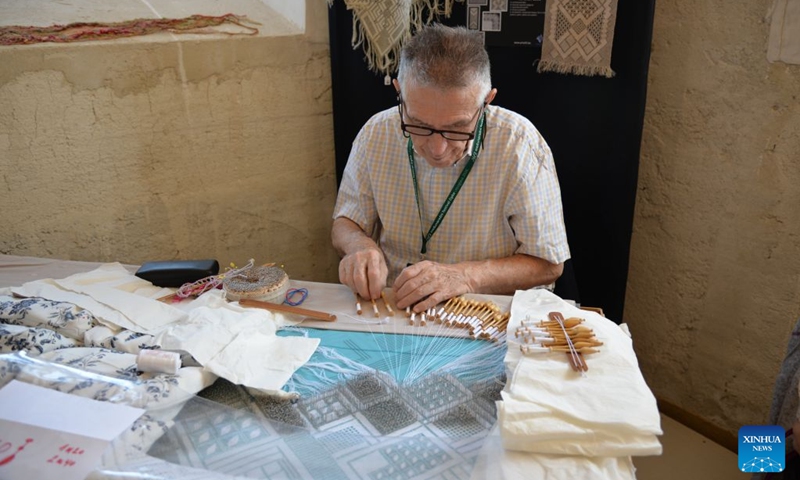 A man makes lace at the 30th Lepoglava International Lace Festival in Lepoglava, Croatia on Sept. 12, 2026. The 30th Lepoglava International Lace Festival opened on Friday in the northern Croatian town of Lepoglava. (Xinhua/Ma Zhen)