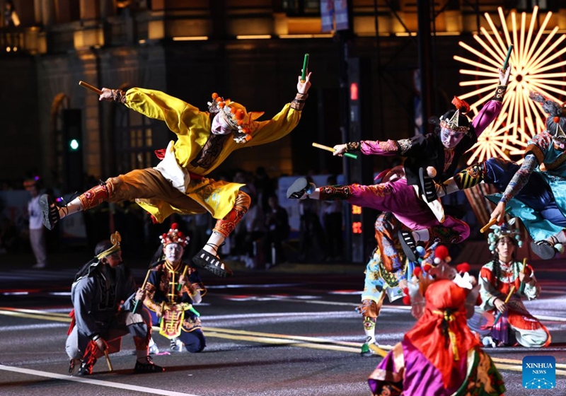 A Yingge folk dance troupe from Puning of south China's Guangdong Province performs during the parade of the Shanghai Tourism Festival in Shanghai, east China, Sept. 12, 2026. The 37th Shanghai Tourism Festival parade was launched at the Bund in Shanghai on Saturday. A total of 21 floats and 21 performing teams took part in the parade. Photo: Xinhua