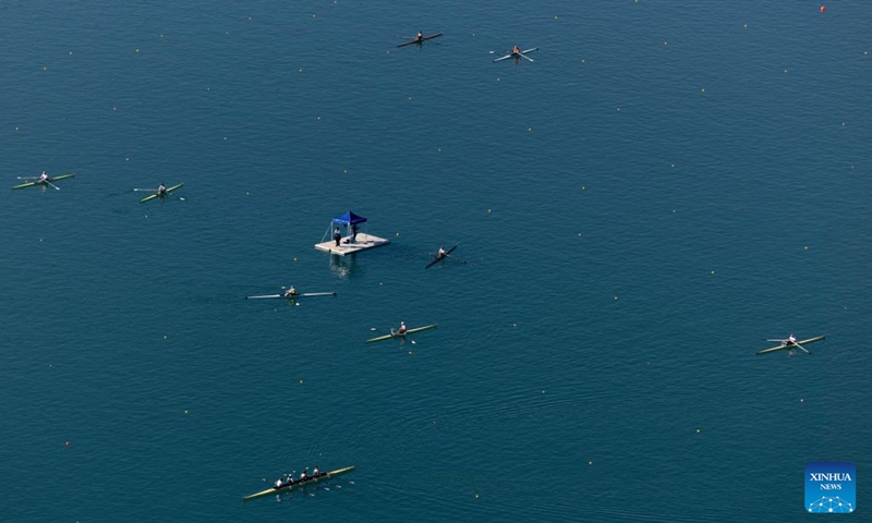 Boats are seen on Lake Bled during the 2026 World Rowing Masters Regatta Bled in Bled, Slovenia, Sept. 12, 2026. (Photo by Zeljko Stevanic/Xinhua)
