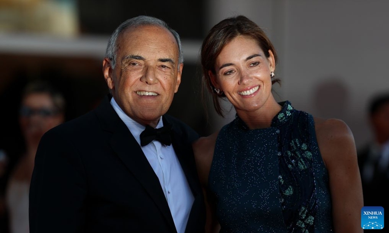 Alberto Barbera (L), artistic director of the 83rd Venice Film Festival, poses with his wife at the red carpet of the 83rd Venice International Film Festival closing ceremony in Venice, Italy, Sept. 12, 2026. Photo: Xinhua