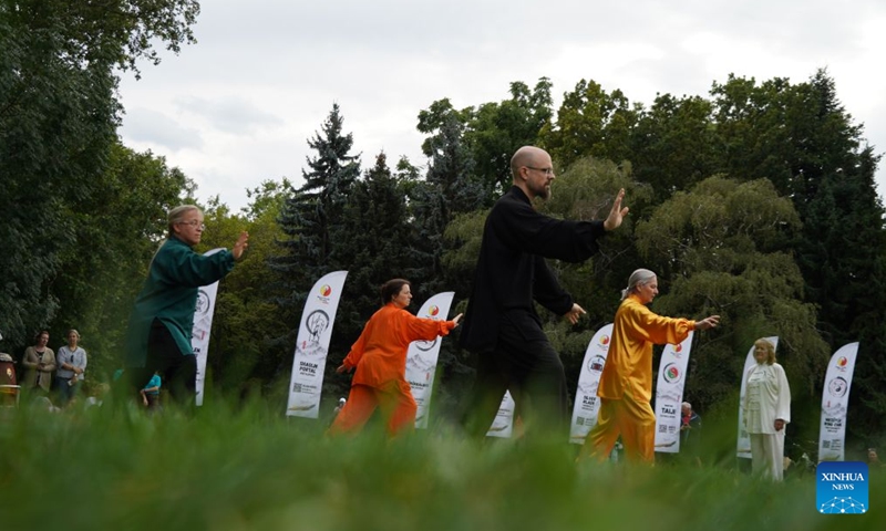 People perform Taiji during the 6th Family and Friends Gathering of the Hungarian Chan Wu Federation on Margaret Island in Budapest, Hungary, Sept. 13, 2026. (Xinhua/Chen Hao)

