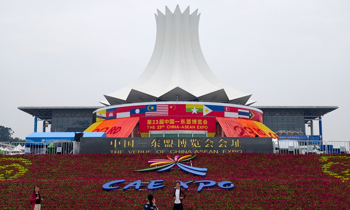 Visitors pose for photos in front of a landmark marking the 23rd China-ASEAN Expo at the Nanning International Convention and Exhibition Center in Nanning, South China's Guangxi Zhuang Autonomous Region, on September 15, 2026. The expo is scheduled to be held from September 17 to 21. Photo: VCG