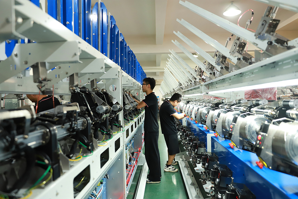 Workers rush to make a batch of products for clients at a textile machinery company in Taizhou, East China's Zhejiang Province on September 16, 2026. China exported 11.12 trillion yuan ($1.66 trillion) worth of machinery and electronic products in the first seven months of 2026, up 21.2 percent year-on-year. Photo: VCG