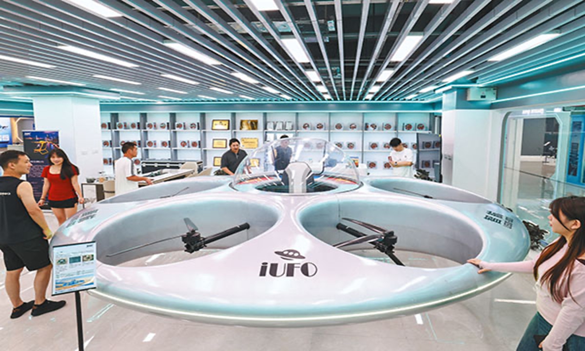 A viral video claiming Yiwu is now selling UFOs draws attention to a flying-saucer-shaped manned eVTOL aircraft on display at the Yiwu Global Digital Trade Center in East China's Zhejiang Province. Photo: Screenshot of local media report