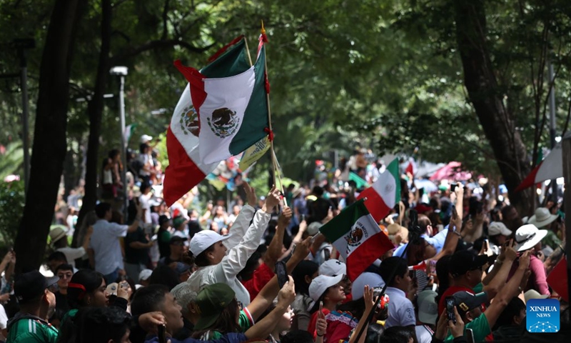 People watch an Independence Day military parade in Mexico City, Mexico, on Sept. 16, 2026. The parade was held here on Wednesday to mark the 216th anniversary of Mexico's independence. (Xinhua/Fang Sixian)