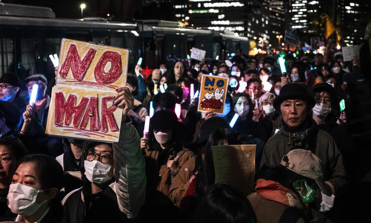 People participate in a protest outside the parliament building in Tokyo, Japan, April 8, 2026. Photo: Xinhua
