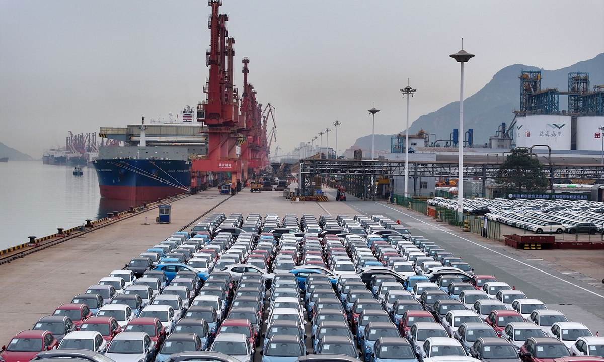 Domestically produced vehicles await shipment for export markets at a terminal of Lianyungang Port in Lianyungang, East China's Jiangsu Province, on September 17, 2026. In the first eight months of this year, China's passenger vehicle exports exceeded 6 million units, up 75.7 percent year-on-year. Photo: VCG