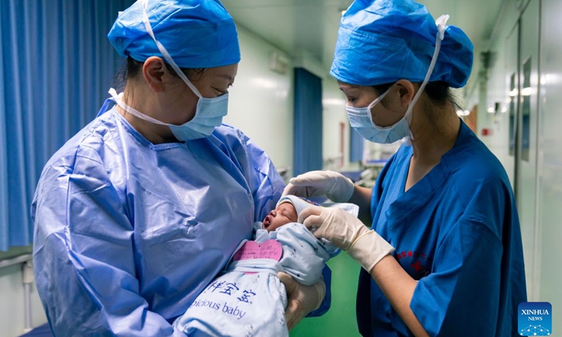 Medical staff members take care of a newborn on the Chinese People's Liberation Army Navy hospital ship Auspicious Ark, docked at the Friendship Port in Nouakchott, Mauritania, on Sept. 16, 2026. A pregnant Mauritanian woman gave birth to a healthy baby boy with the help of Chinese medical staff aboard the Chinese People's Liberation Army Navy hospital ship Auspicious Ark on Wednesday. The Chinese People's Liberation Army Navy hospital ship Auspicious Ark arrived in Mauritania on Tuesday for a seven-day friendly visit, during which it would provide medical services. (Photo: Xinhua)