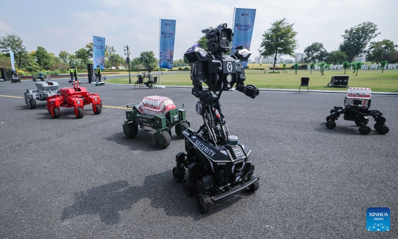Robots are seen during the 9th China Robotop Summit in Hangzhou, east China's Zhejiang Province, Sept. 17, 2026. This summit kicked off at Hangzhou Future Sci-Tech City here on Thursday. Themed Smart Connectivity for a New Ecosystem, Empowering All Scenarios: The Intelligent and Qualitative Transformation in the 'Robot+' Era, the event served as a premier platform for academic exchange, industrial matchmaking, and exhibition within the robotics sector. (Photo: Xinhua)