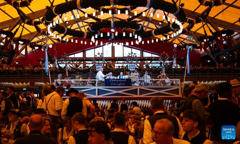 A band performs at the Oktoberfest in Munich, Germany, Sept. 19, 2026. The 191st Oktoberfest, one of the largest folk festivals in Germany, opened on Saturday in Munich, with mayor Dominik Krause tapping the first barrel of beer as a tradition. This year's festival will last until Oct. 4. Photo: Xinhua
