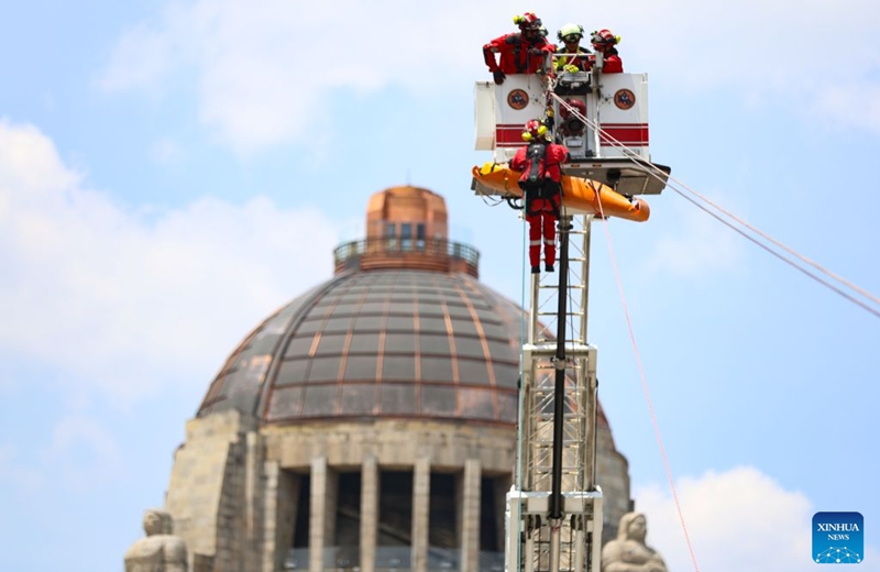Emergency rescue team members take part in the Second National Earthquake Drill 2026, in Mexico City, capital of Mexico, on Sept. 19, 2026. (Photo by Francisco Canedo/Xinhua)