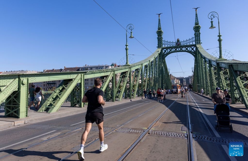 People attend a car-free weekend event in Budapest, Hungary, on Sept. 19, 2026. Budapest is holding a car-free weekend on Sept. 19-20 as part of European Mobility Week, promoting environmentally friendly and sustainable travel through public transport vehicle displays, cycling activities and family events. (Xinhua/Hu Zhixuan)