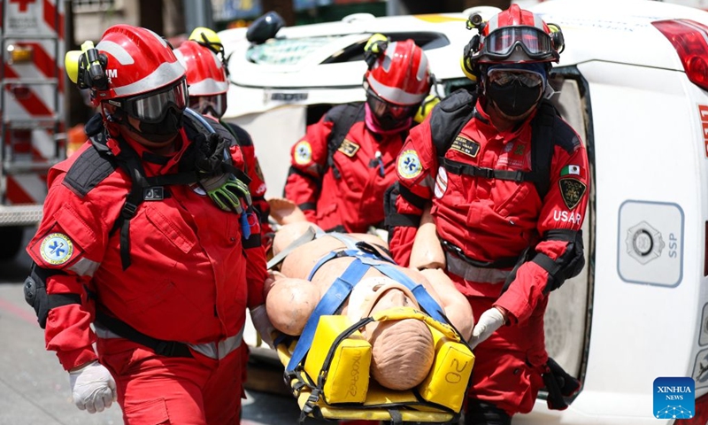 Emergency rescue team members take part in the Second National Earthquake Drill 2026, in Mexico City, capital of Mexico, on Sept. 19, 2026. (Photo by Francisco Canedo/Xinhua)