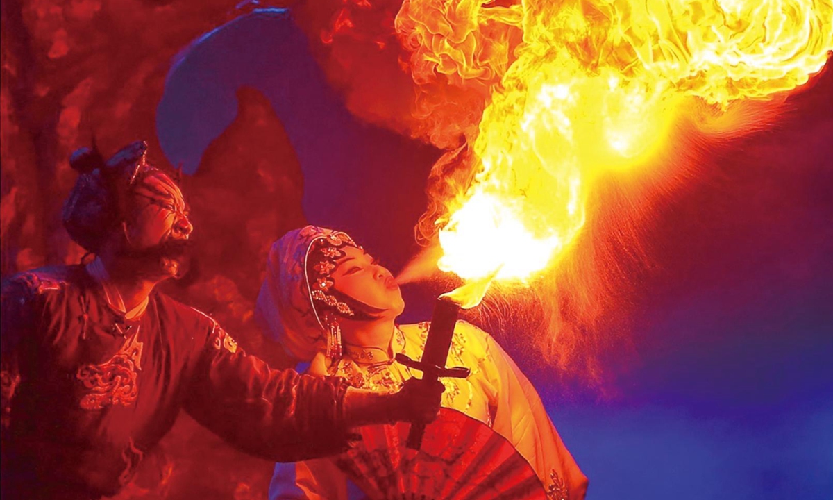 Li Mei performs fire-blowing Photo: Courtesy of Li Mei