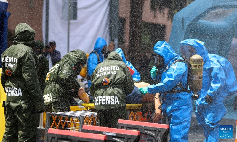 Emergency rescue team members take part in the Second National Earthquake Drill 2026, in Mexico City, capital of Mexico, on Sept. 19, 2026. (Photo by Francisco Canedo/Xinhua)