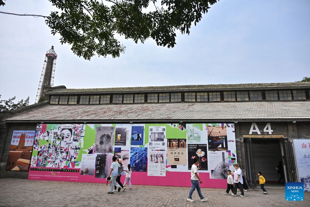 People visit the 26th Pingyao International Photography Festival (PIP) in Pingyao ancient town in Jinzhong, north China's Shanxi Province, Sept. 19, 2026. The 26th PIP kicked off here on Saturday, featuring works by more than 2,600 photographers from over 30 countries and regions. The event will run until Sept. 23. (Xinhua/Sun Ruibo)