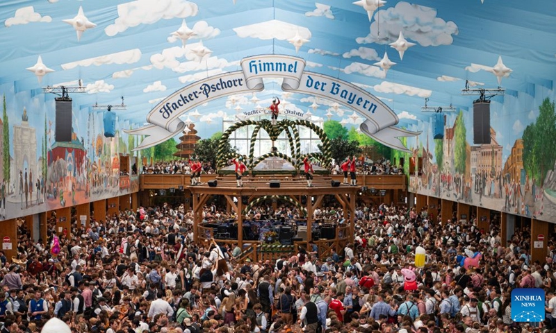 People enjoy beer at the Oktoberfest in Munich, Germany, Sept. 19, 2026. The 191st Oktoberfest, one of the largest folk festivals in Germany, opened on Saturday in Munich, with mayor Dominik Krause tapping the first barrel of beer as a tradition. This year's festival will last until Oct. 4. Photo: Xinhua