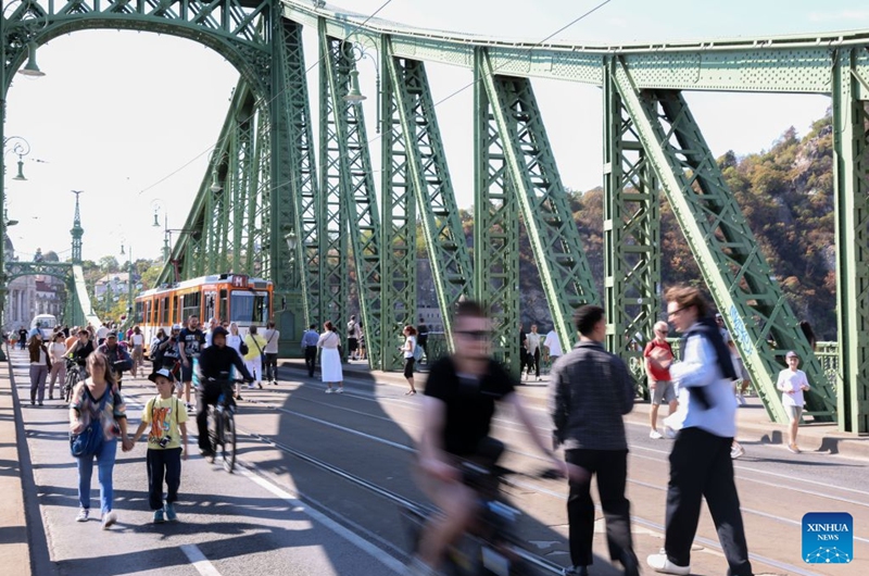 People attend a car-free weekend event in Budapest, Hungary, on Sept. 19, 2026. Budapest is holding a car-free weekend on Sept. 19-20 as part of European Mobility Week, promoting environmentally friendly and sustainable travel through public transport vehicle displays, cycling activities and family events. (Xinhua/Hu Zhixuan)