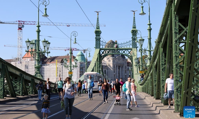 People attend a car-free weekend event in Budapest, Hungary, on Sept. 19, 2026. Budapest is holding a car-free weekend on Sept. 19-20 as part of European Mobility Week, promoting environmentally friendly and sustainable travel through public transport vehicle displays, cycling activities and family events. (Xinhua/Hu Zhixuan)