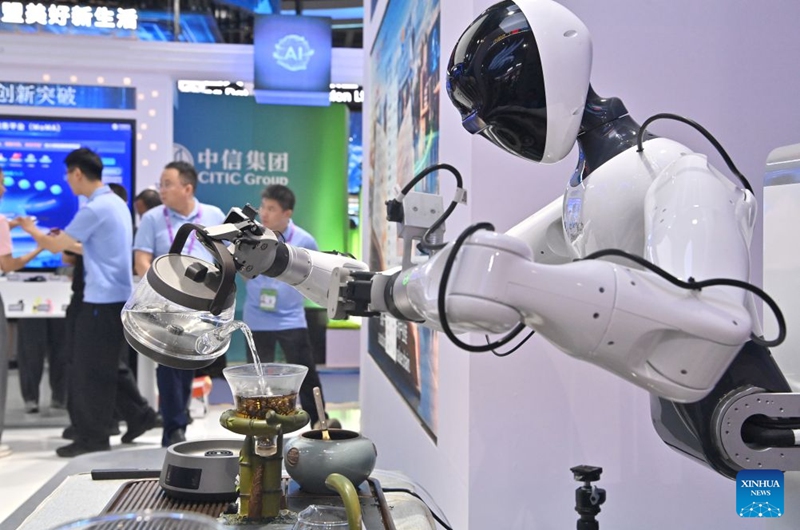 A robot performs tea ceremony at the 23rd China-ASEAN Expo in Nanning, south China's Guangxi Zhuang Autonomous Region, Sept. 18, 2026. Multiple intelligent robots were showcased and demonstrated a variety of skills at the China-ASEAN Expo. (Xinhua/Zhou Hua)