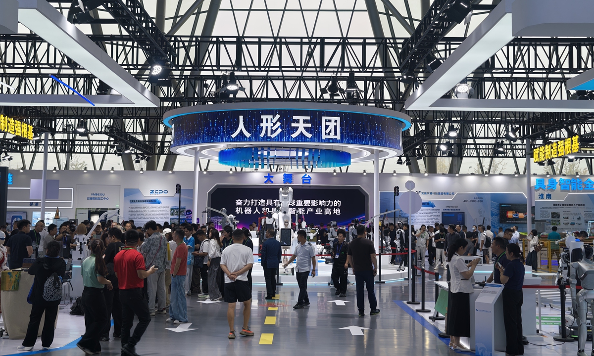 Visitors tour the humanoid robot zone at the 2026 World Manufacturing Convention in Hefei, East China's Anhui Province, on September 20, 2026. Photo:  Tao Mingyang/GT