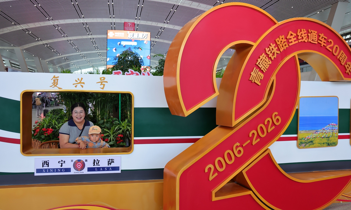 Tourists pose for photos in the waiting hall of Xining Railway Station in Northwest China's Qinghai Province on June 24, 2026. Photo: VCG