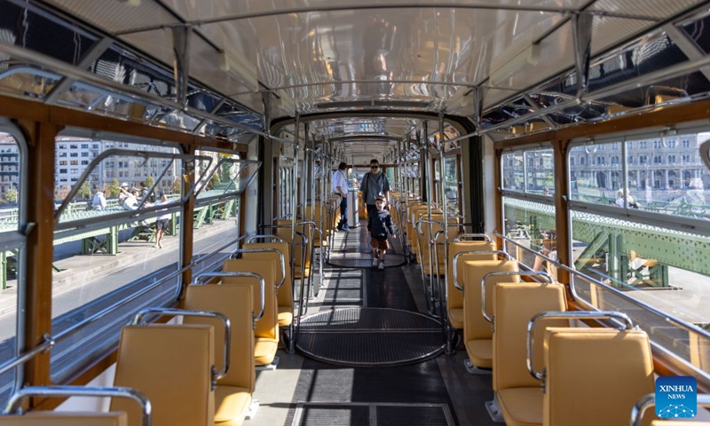 People visit the interior of a tram during a car-free weekend event in Budapest, Hungary, on Sept. 19, 2026. Budapest is holding a car-free weekend on Sept. 19-20 as part of European Mobility Week, promoting environmentally friendly and sustainable travel through public transport vehicle displays, cycling activities and family events. (Xinhua/Hu Zhixuan)