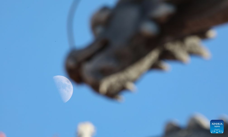 This photo taken on Sept. 19, 2026 shows the first quarter moon in the sky in Jinghong City, southwest China's Yunnan Province. Photo: Xinhua