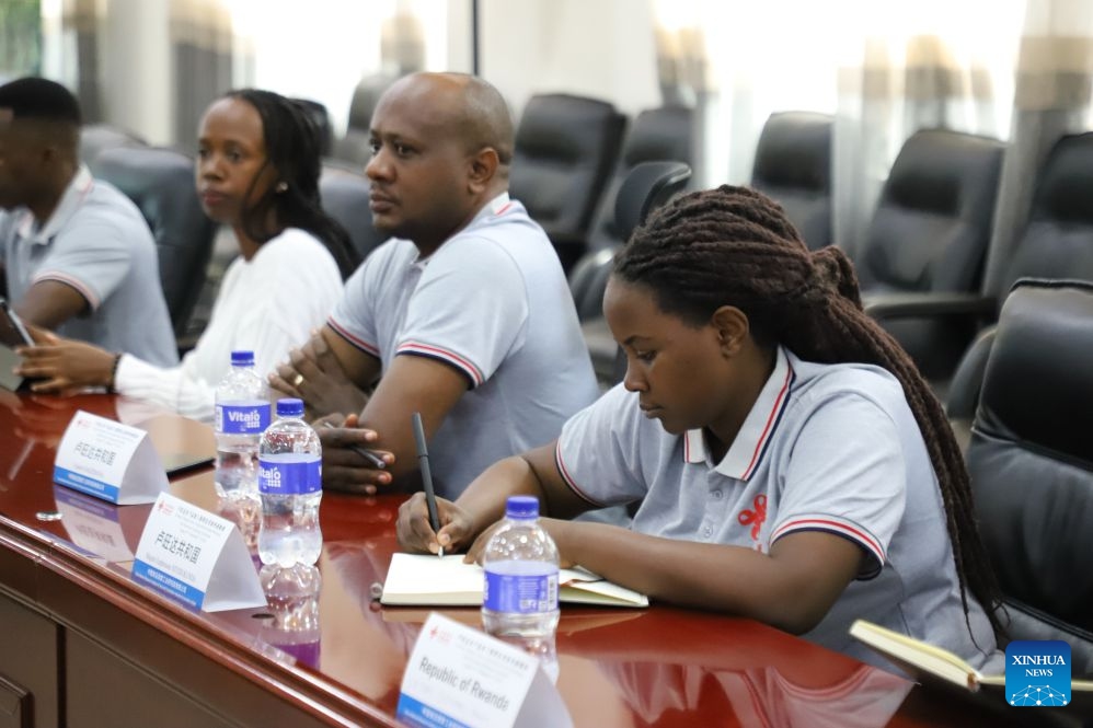 A trainee takes notes during a program named the Overseas Training Course on Agricultural Product Processing and Preservation Technology for Rwanda in Kigali, Rwanda, Sept. 11, 2026. (Xinhua/Ju Yinhe)