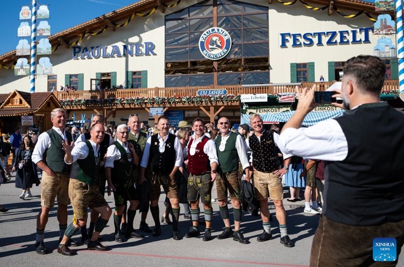 People pose for photos at the Oktoberfest in Munich, Germany, Sept. 19, 2026. The 191st Oktoberfest, one of the largest folk festivals in Germany, opened on Saturday in Munich, with mayor Dominik Krause tapping the first barrel of beer as a tradition. This year's festival will last until Oct. 4. Photo: Xinhua