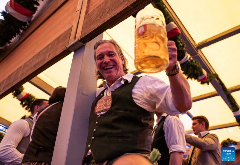 A man enjoys beer at the Oktoberfest in Munich, Germany, Sept. 19, 2026. The 191st Oktoberfest, one of the largest folk festivals in Germany, opened on Saturday in Munich, with mayor Dominik Krause tapping the first barrel of beer as a tradition. This year's festival will last until Oct. 4. Photo: Xinhua
