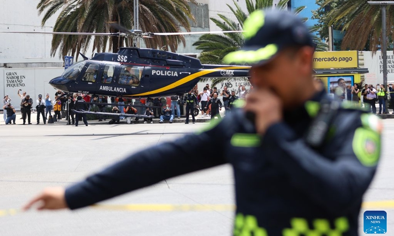 A police helicopter takes part in the Second National Earthquake Drill 2026, in Mexico City, capital of Mexico, on Sept. 19, 2026. (Photo by Francisco Canedo/Xinhua)