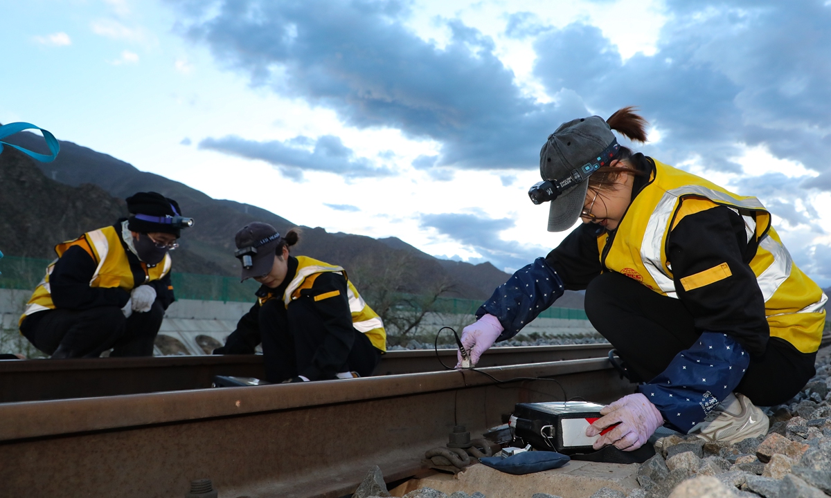 Members of an all-female rail inspection team from China Railway 12th Bureau Group's railway maintenance company inspect rail welds in Lhasa, Xizang Autonomous Region, on June 22, 2026. Photo: VCG