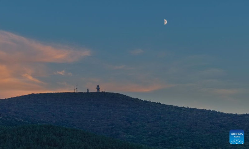 This photo taken on Sept. 19, 2026 shows the first quarter moon in the sky in Yimei District of Yichun City, northeast China's Heilongjiang Province. Photo: Xinhua