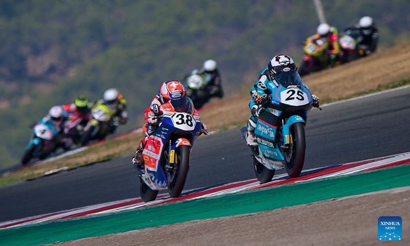 CFMOTO Aspar's rider Sun Shengbo (R) of China competes during the race 1 of the ESBK Talent category at the 2026 Spanish Superbike Championship Navarra in Navarra, Spain, Sept. 19, 2026. Photo: Xinhua