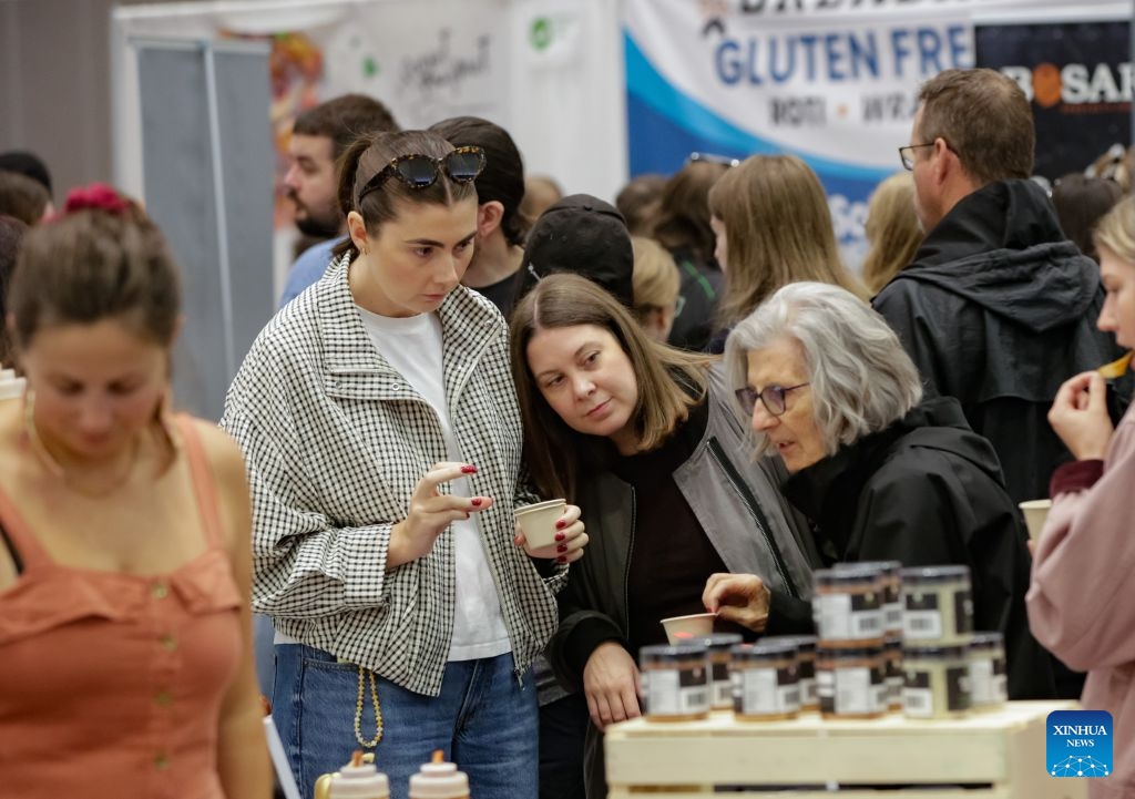 Visitors browse gluten free food products at the Gluten Free Expo in Vancouver, British Columbia, Canada, Sept. 20, 2026. The event featured gluten-free food and beverage products, sampling, shopping and educational presentations. (Photo by Liang Sen/Xinhua)