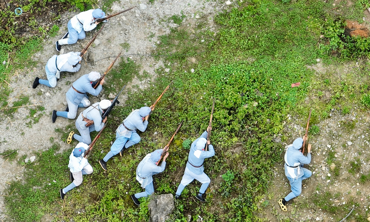 Actors and visitors perform in the immersive live-action production Victory at Loushan Pass at the foot of Loushan Pass in Huichuan District, Zunyi, Southwest China's Guizhou Province. Photos: VCG, Courtesy of Huichuan District Culture and Tourism Bureau