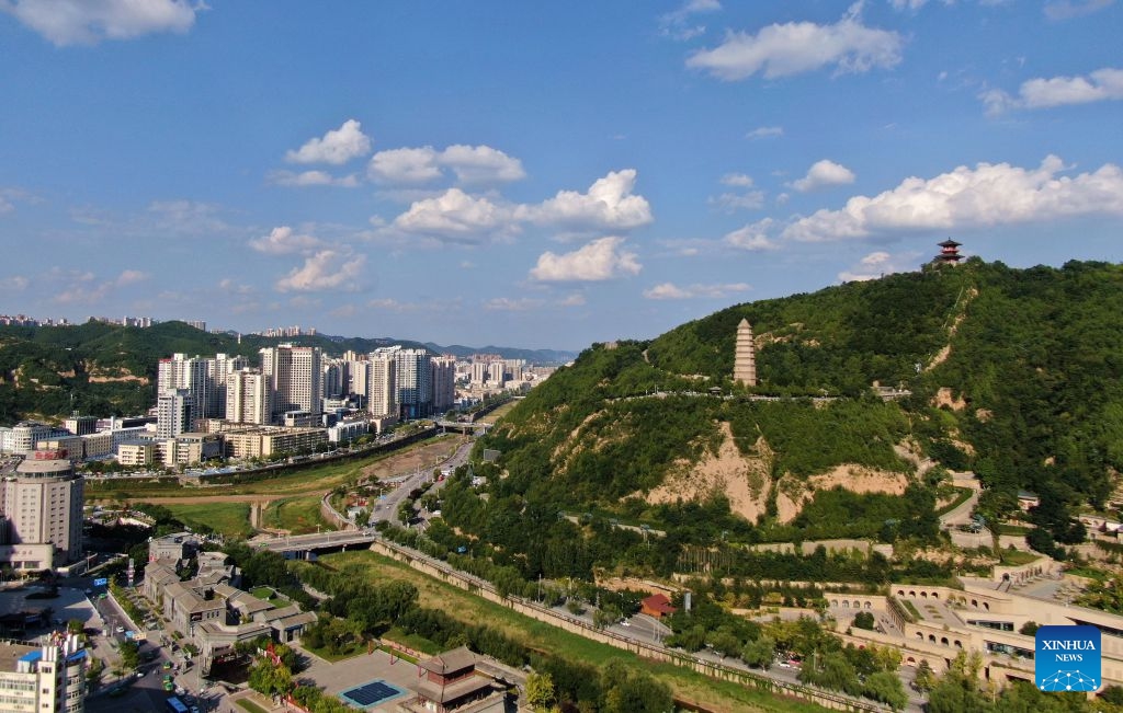 An aerial drone photo taken on Sept. 15, 2026 shows a view of the Baota Mountain in Yan'an City, northwest China's Shaanxi Province. At the end of 2025, the Xi'an-Yan'an high-speed railway began operation, formally integrating Yan'an into the national high-speed rail network. The railway has boosted tourism in Yan'an, which welcomed over 50 million domestic and international tourists in 2025.
Once a revolutionary base, Yan'an has evolved into a city that is increasingly attractive as a place to live, work, and visit. (Xinhua/Li Yibo)