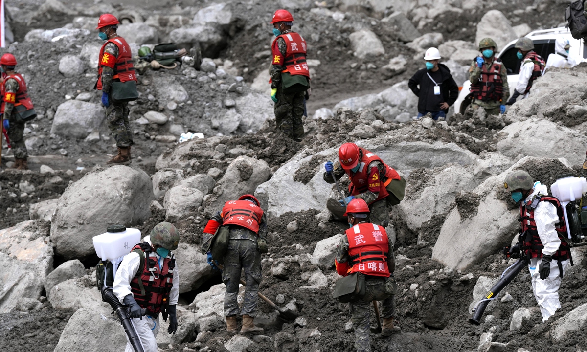 A medical team carries out disinfection work in the core disaster area at Gyirong Port in Southwest China's Xizang Autonomous Region, on September 3, 2026. Photo: VCG