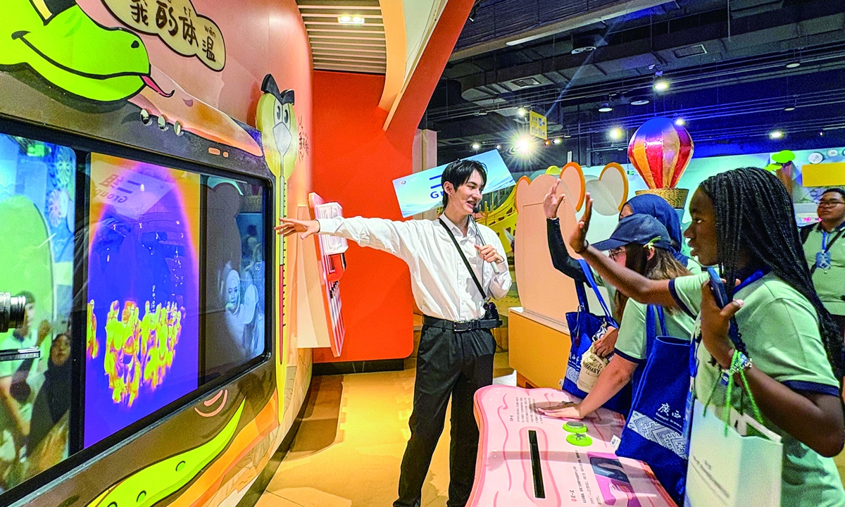Students try out an interactive display at the Guangxi Science and Technology Museum in Nanning, Guangxi, on September 20, 2026. Photo: Li Hang/GT