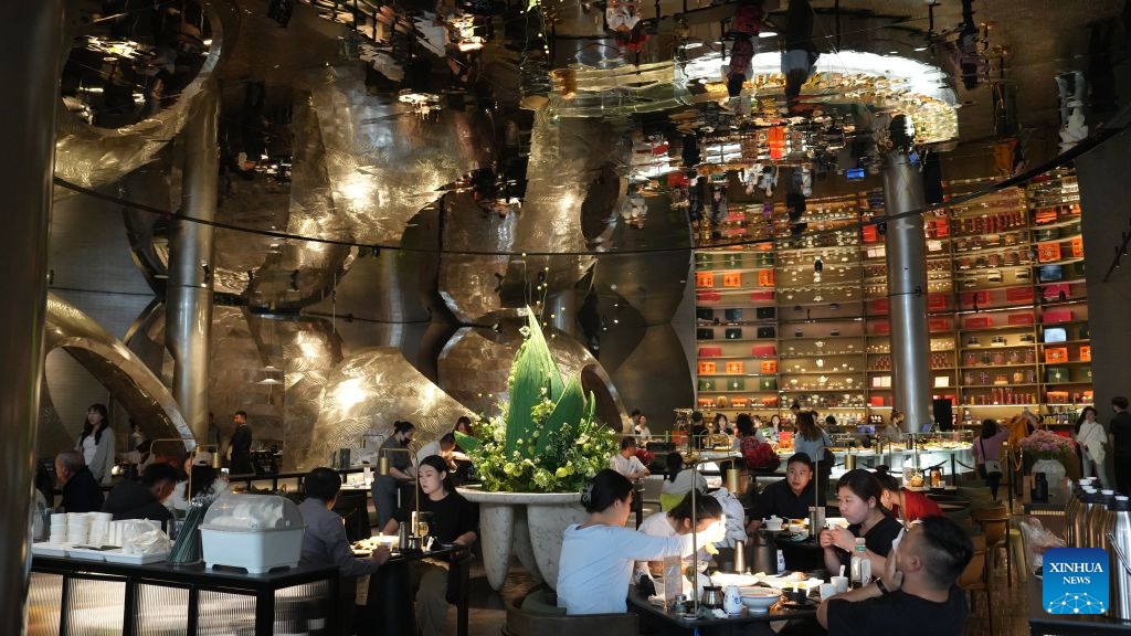 People enjoy food at a morning tea restaurant in Wuzhong, northwest China's Ningxia Hui Autonomous Region, Sept. 21, 2026. Nestled along the banks of the Yellow River, Wuzhong has cultivated a unique culinary culture through centuries of trade and cultural exchange.(Xinhua/Liu Hai)