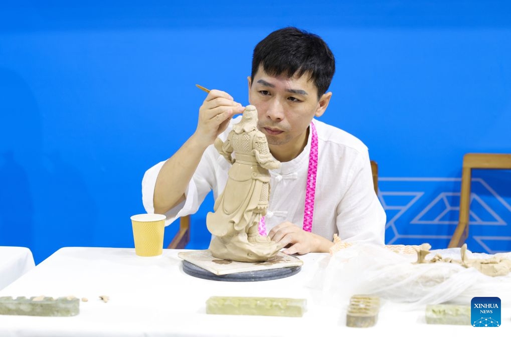 A ceramic art master demonstrates the craftsmanship of Dehua porcelain during the WorldSkills Shanghai 2026 Expo in east China's Shanghai, Sept. 23, 2026. The expo kicked off here on Wednesday. (Photo: Xinhua)