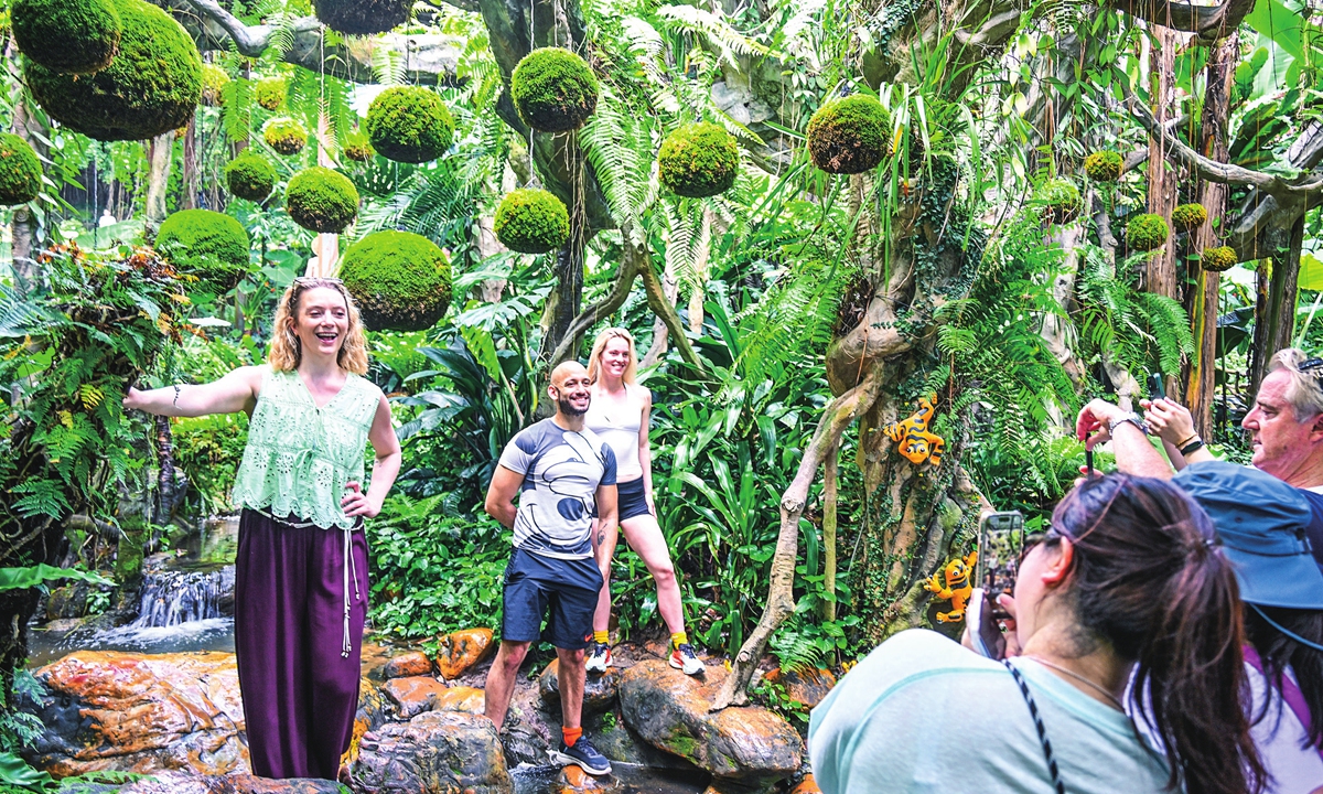 Foreign tourists visit a plant garden in Qingxiu Mountain scenic area in Nanning, South China's Guangxi Zhuang Autonomous Region on May 25, 2026.