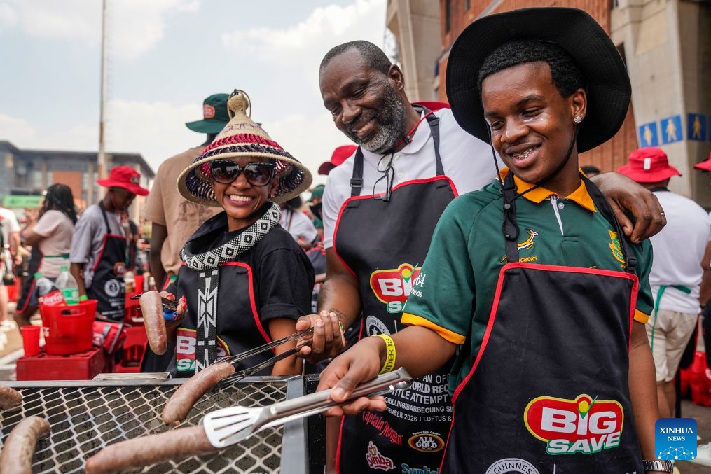 People participate in a barbecue festival at Loftus Stadium of Pretoria, South Africa, Sept. 24, 2026. The festival was held here on Thursday and attracted more than 2,000 people to participate. (Photo by Shiraaz Mohamed/Xinhua)