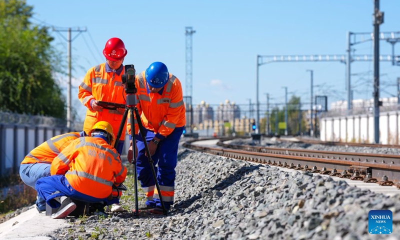 Staff members of China Railway Harbin Group Co., Ltd. conduct an emergency maintenance drill at Tieli Railway Station along the Harbin-Yichun high-speed railway in northeast China's Heilongjiang Province, Sept. 24, 2026. As the Harbin-Yichun high-speed railway, China's northernmost high-speed railway, enters the final countdown to opening, workers are carrying out intensive training, emergency drills, equipment inspections and surveying to ensure its safe operation.
With a designed speed of 250 kilometers per hour, the 318-km line will slash travel time between Harbin and Yichun from about seven hours to just two hours once it becomes operational. Photo: Xinhua