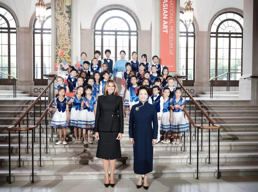 Peng Liyuan, wife of Chinese President Xi Jinping, and Melania Trump, wife of U.S. President Donald Trump, visit the National Museum of Asian Art in Washington, D.C., the United States, Sept. 24, 2026. (Xinhua/Ding Lin)