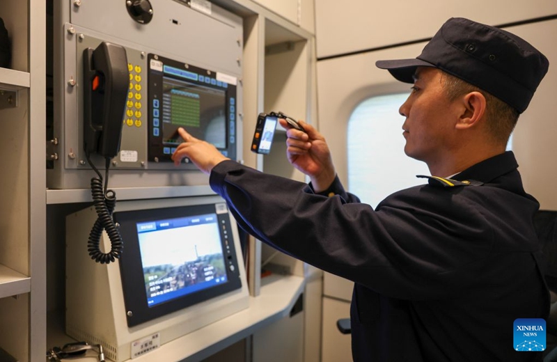 A mechanistic monitors data on a trial Electric Multiple Unit (EMU) train running along the Harbin-Yichun high-speed railway in northeast China's Heilongjiang Province, Sept. 22, 2026. As the Harbin-Yichun high-speed railway, China's northernmost high-speed railway, enters the final countdown to opening, workers are carrying out intensive training, emergency drills, equipment inspections and surveying to ensure its safe operation.
With a designed speed of 250 kilometers per hour, the 318-km line will slash travel time between Harbin and Yichun from about seven hours to just two hours once it becomes operational. Photo: Xinhua